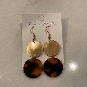 Pierced dangly earrings. Brand new. Never worn.